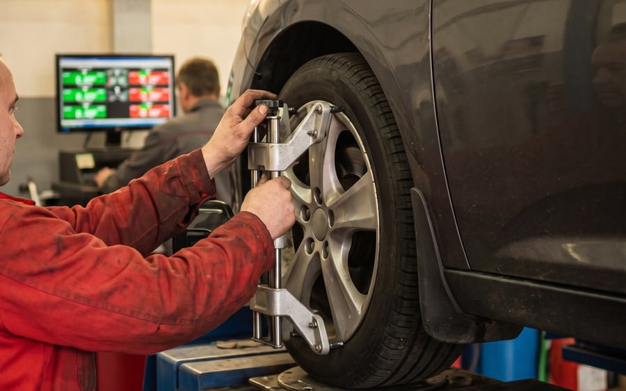 Technician adjusting the geometry of a Brabus at A to Z Car Service
