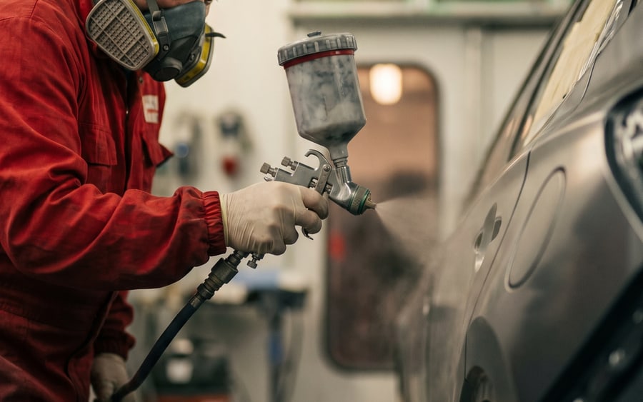 Colour-matched paint being sprayed onto a Brabus in Dubai
